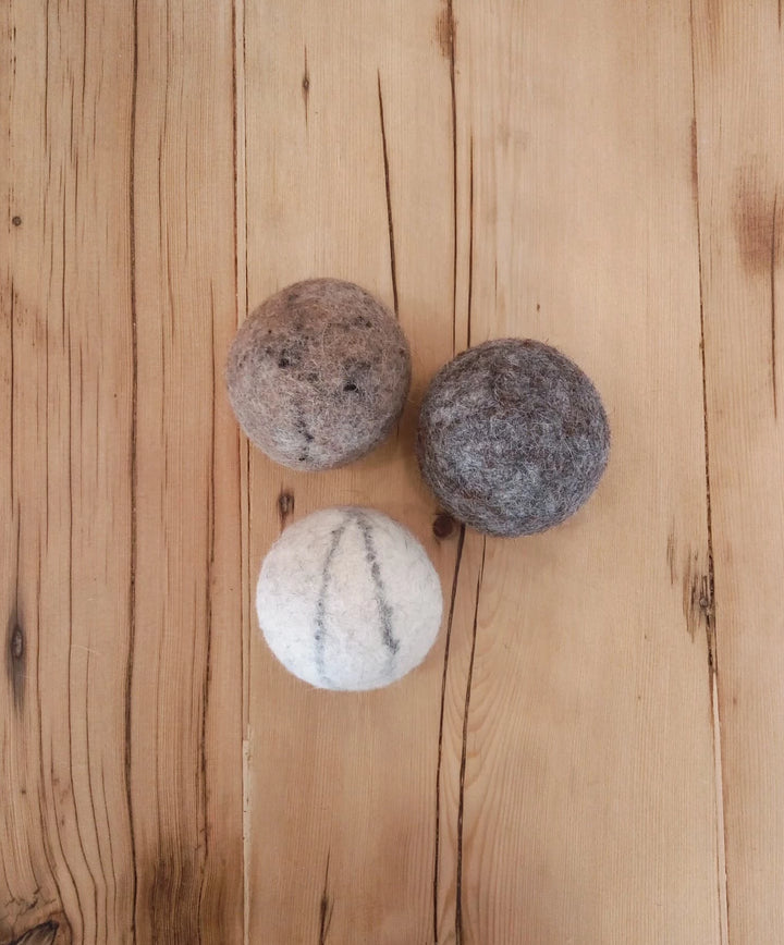 Trio of alpaca wool dryer balls in a linen and hemp bag