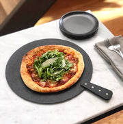 Pizza board with riveted brass handle
